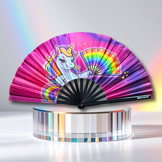 Colorful, unicorn Clack Fan on raised pedestal made of prism glass